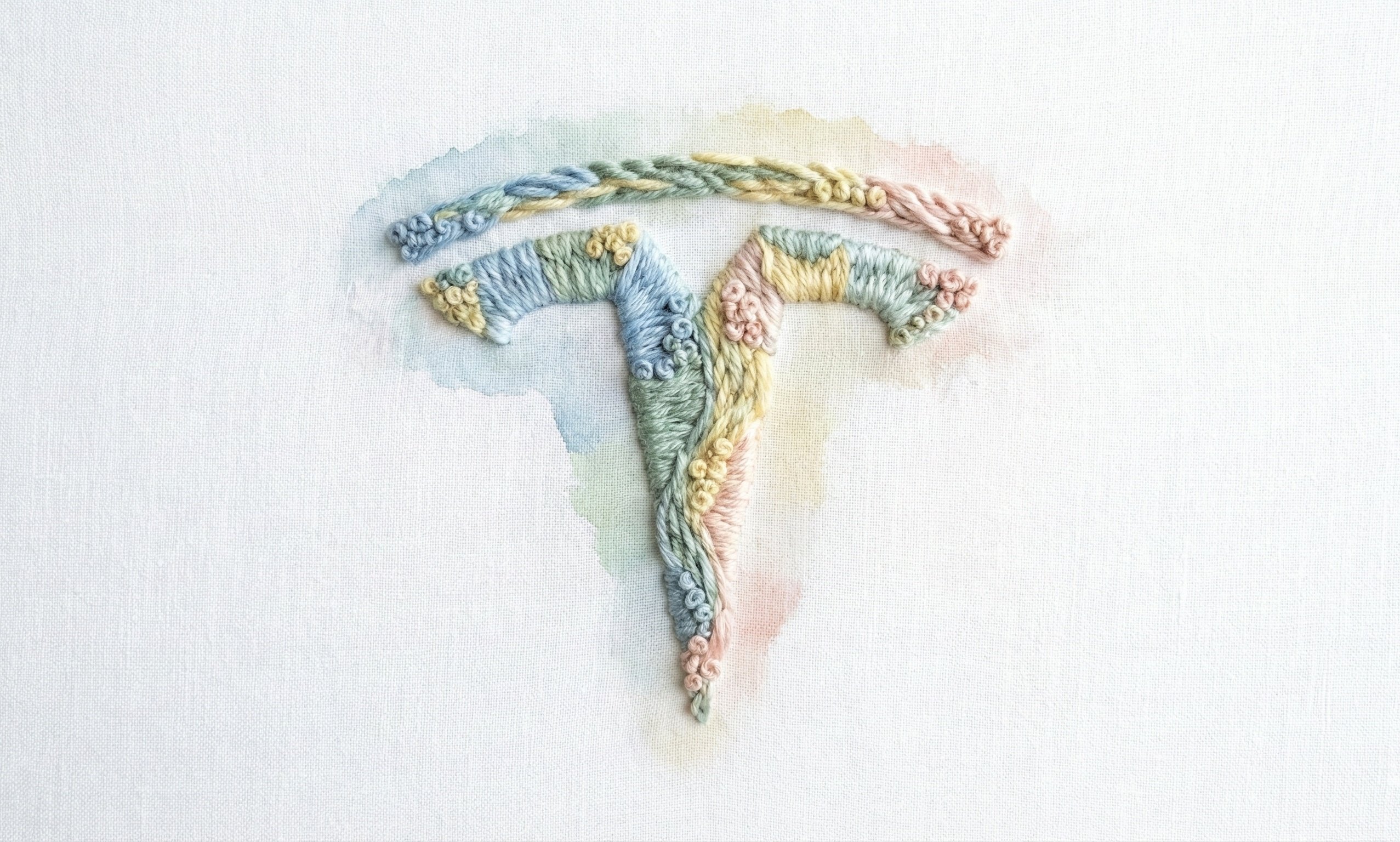 Transforming Logos into Embroidered Emblems - AI generated image
